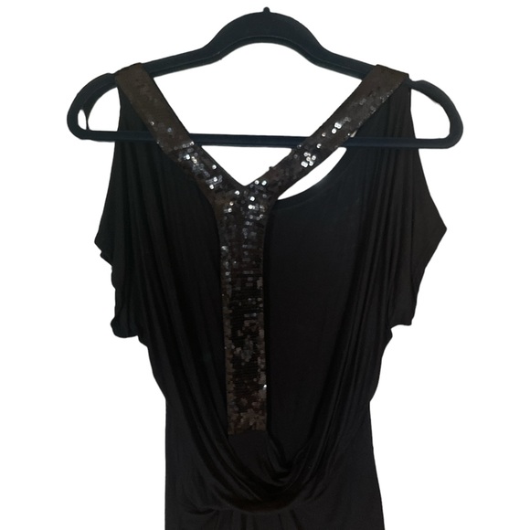 Very cute festive shirt only wore a couple of times. Detail on back. - Picture 2 of 2